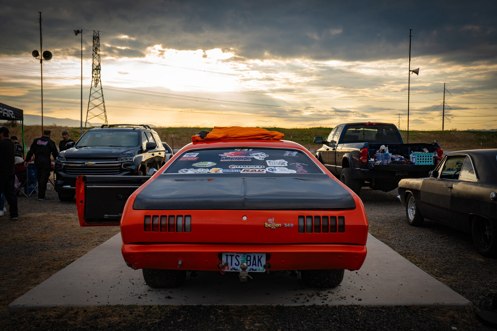 Sportsman dragster accelerating through the timing lights